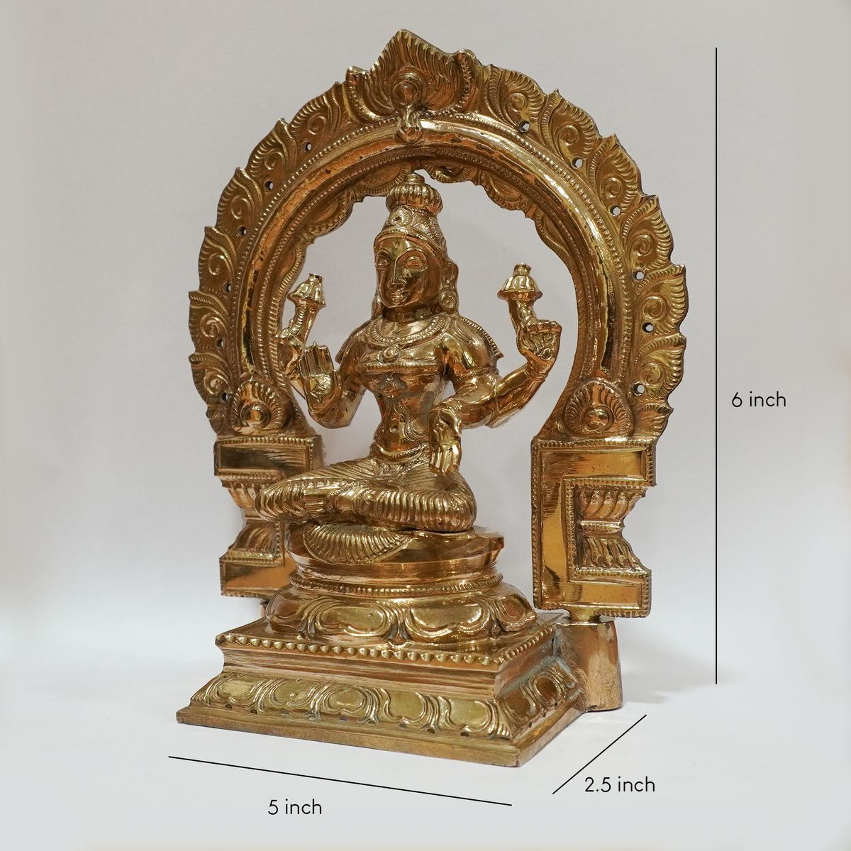 BRONZE LAKSHMI IDOL WITH PRABHAVALI
