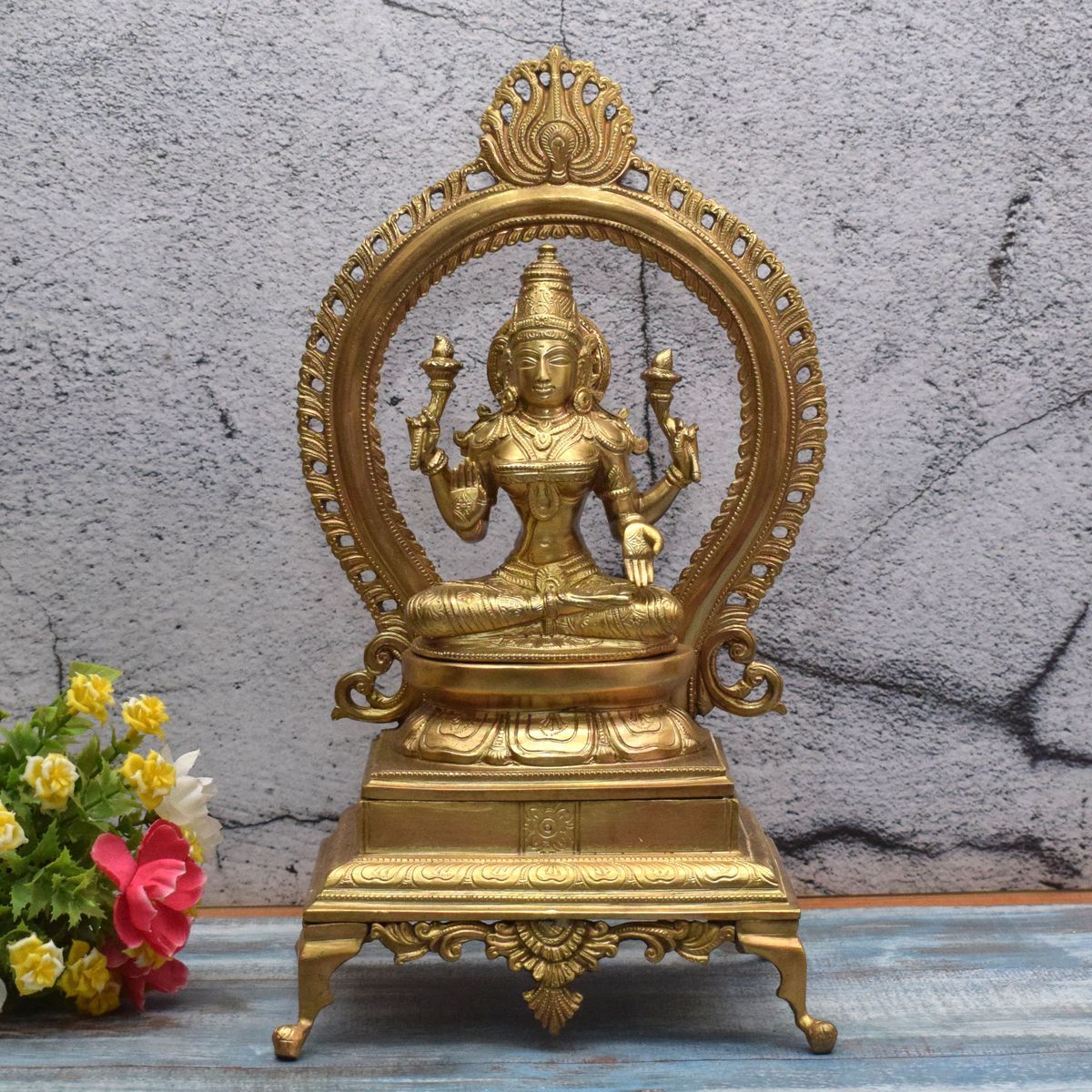 BRONZE LAKSHMI IDOL WITH PRABHAVALI